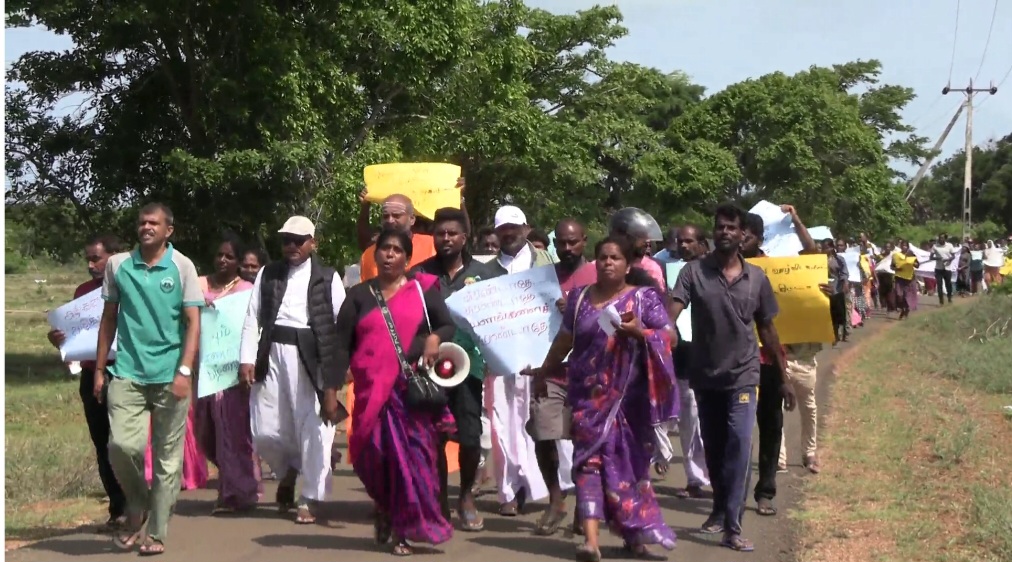 Protesters march in Poonakary