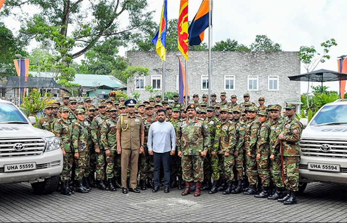 Sri Lankan President with deploying personnel